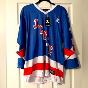 JCole Jersey size Medium. New with tags